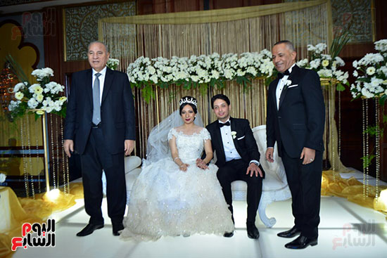 العروسان وسط الإعلامى أحمد موسى و المستشار أحمد الزند