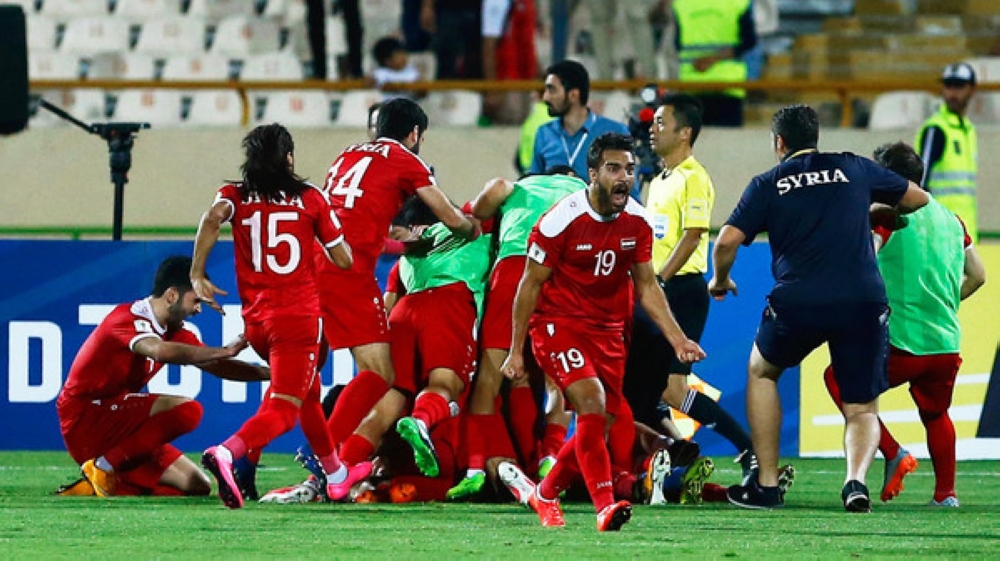 فرحة لاعبى سوريا بالتعادل مع إيران فرحة لاعبى سوريا بالتعادل مع إيران
