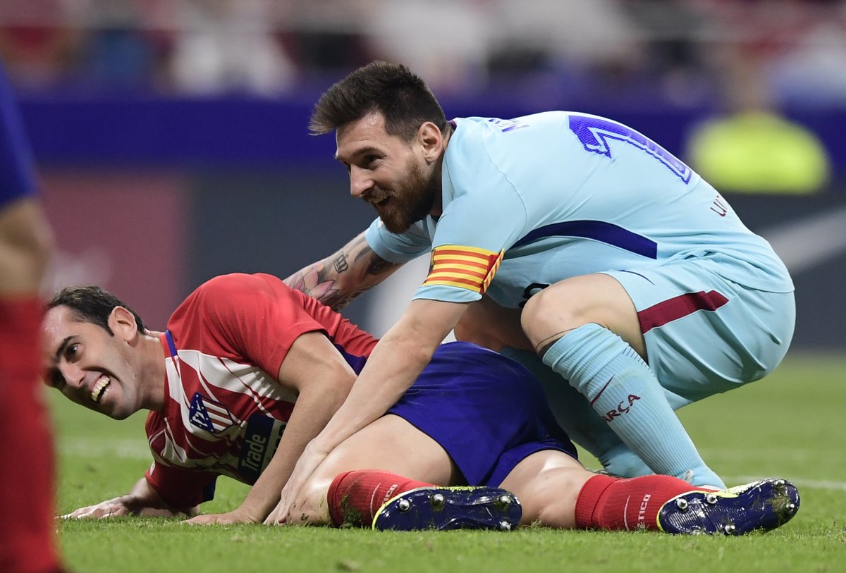 جانب من مباراة سابقة بين برشلونة واتلتيكو مدريد جانب من مباراة سابقة بين برشلونة واتلتيكو مدريد