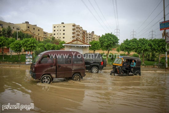 تراكمات الأمطار تحول الشوارع إلى برك من المياه -اليوم السابع -11 -2015
