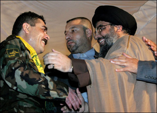 القنطار مع زعيم حزب الله حسن نصر الله -اليوم السابع -12 -2015