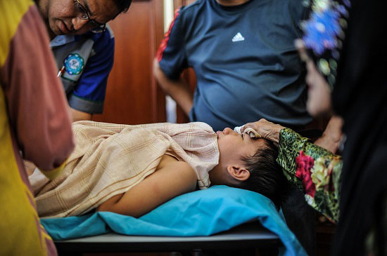 طفل يتألم أثناء العملية الجراحية  -اليوم السابع -12 -2015