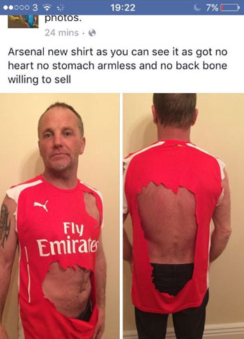 Arsenal-fan-rips-shirt