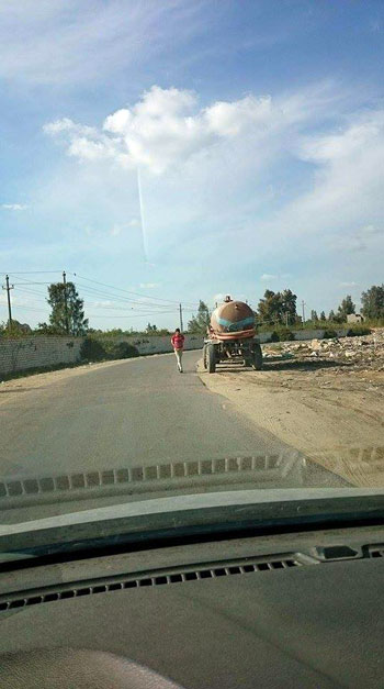 إلقاء المخلفات بالطريق العام بالبحيرة (4)