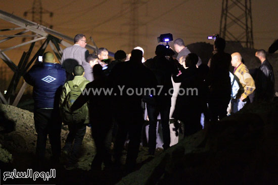 المصورين خلال تغطيتهم لحادث تفجير برجى كهرباء بالإنتاج الإعلامى -اليوم السابع -4 -2015