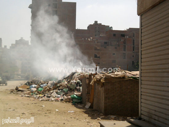 	تلال القمامة والمخلفات تغرق منطقة أرض اللواء شارع ترعة المجنونة  -اليوم السابع -4 -2015