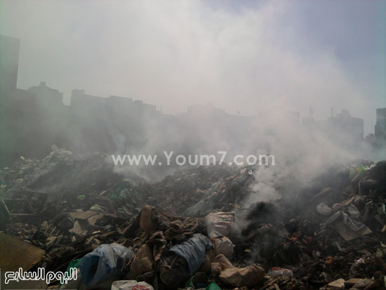 	أدخنة كثيفة من حرق المخلفات بشارع ترعة المجنونة  -اليوم السابع -4 -2015