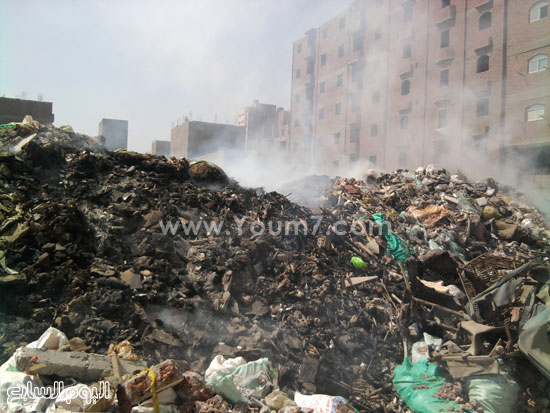 	تلال القمامة والمخلفات تغرق أرض اللواء -اليوم السابع -4 -2015