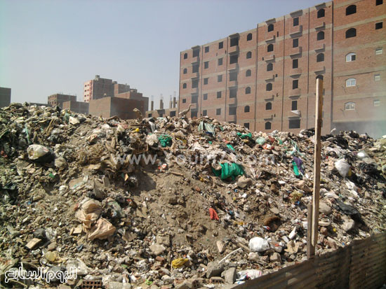 	تزايد كميات القمامة والمخلفات بشوارع أرض اللواء -اليوم السابع -4 -2015