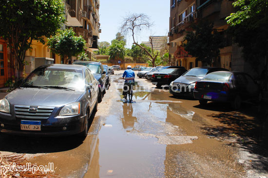  شارع الثورة بالمهندسين غارق فى المياه -اليوم السابع -4 -2015