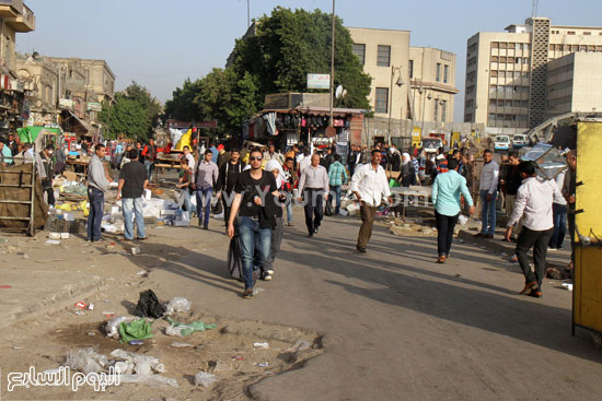  عناصر الحملة توجه نداءات للعمال بالميدان لرفع الإشغالات -اليوم السابع -4 -2015