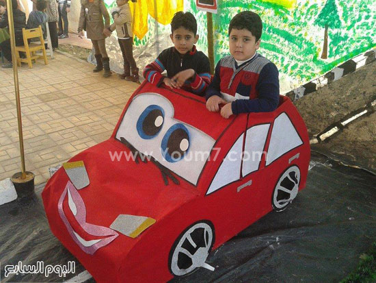أطفال يقودون سيارة ملاكى فى مسابقة المدينة المرورية -اليوم السابع -4 -2015