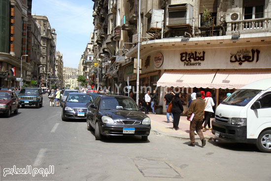  شارع طلعت حرب يتخلص من الباعة الجائلين وأصحاب المحلات يستغلون الأرصفة  -اليوم السابع -4 -2015