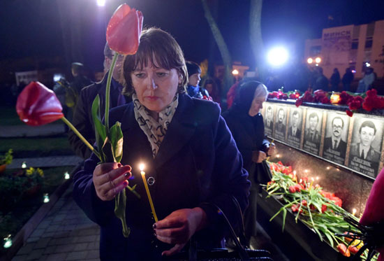 الأوكرانيين يحيون الذكرى الـ 30 لكارثة تشيرنوبيل النووية (8)