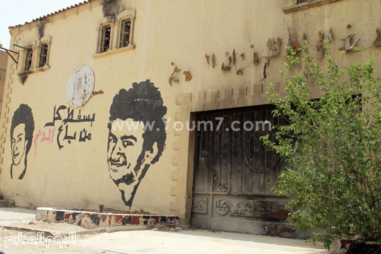 13- جدران المبنى تحمل جرافيتى  للشهداء  -اليوم السابع -5 -2015