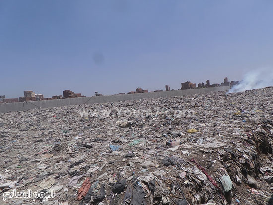 مئات الأطنان من القمامة المتراكمة والمشتعل فيها النيران -اليوم السابع -5 -2015