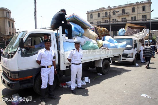 	سيارات الحكومة تحمل المخلفات بميدان العتبة -اليوم السابع -5 -2015