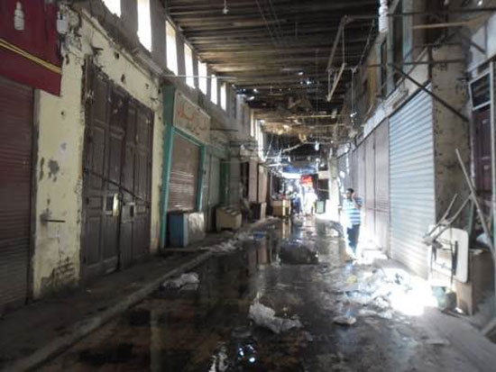 	آثار الحريق على المحلات  -اليوم السابع -5 -2015