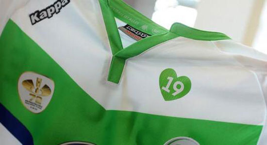 قميص فولفسبورج مطبوع عليه قلب أخضر إحياء لذكرى مالاندا  -اليوم السابع -5 -2015