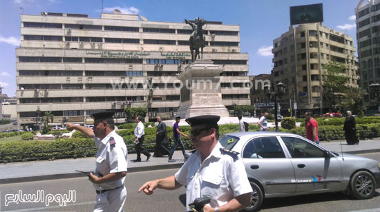 	رجال الشرطة خلال الحملات المرورية فى ميدان الأوبرا -اليوم السابع -5 -2015