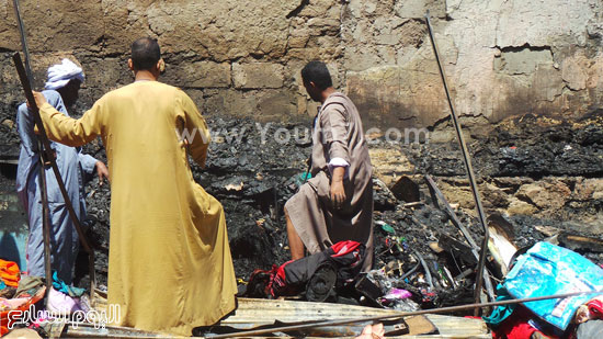 أطلال محل ملابس التهمته النيران  بكوم أمبو  -اليوم السابع -5 -2015