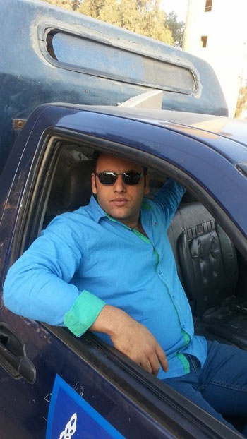 الرائد صلاح الحسينى فى سيارة الشرطة -اليوم السابع -5 -2015