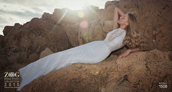 موديل بفستان أبيض أنيق نائمة على صخرة فى لقطة طبيعية رائعة -اليوم السابع -5 -2015