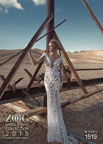 فستان أبيض سادة طويل بكم ينطق بروعة بساطة التصميم ورقيه -اليوم السابع -5 -2015