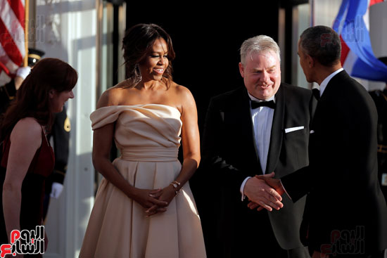 000-ميشيل أوباما تداعب زوجها فى حفل عشاء لرؤساء شمال أوروبا  (19)