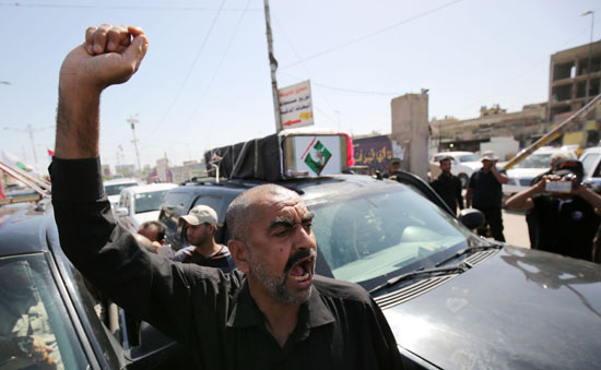 -تشييع-جثامين-محتجين-قتلوا-فى-المنطقة-الخضراء-ببغداد-(2)