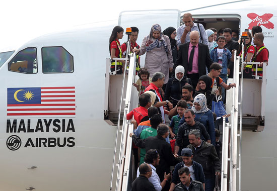 وصول 38 لاجىء سورى إلى ماليزيا بينهم 31 طفلا (4)
