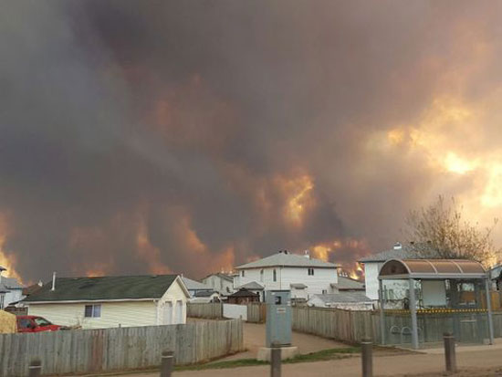 حرائق الغابات فى كندا تتجه جنوبا وتجلى الآلاف عن منازلهم (12)