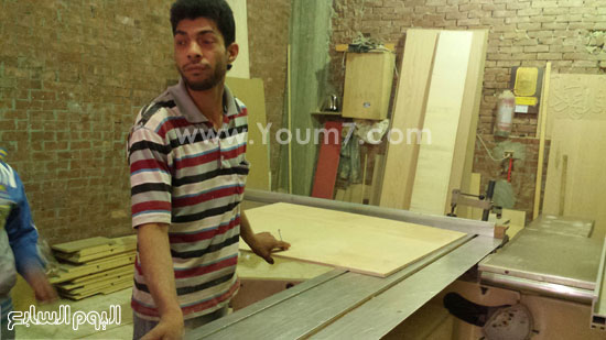 جمعة محمد واقف على سكينة الخشب الكمبيوتر -اليوم السابع -6 -2015