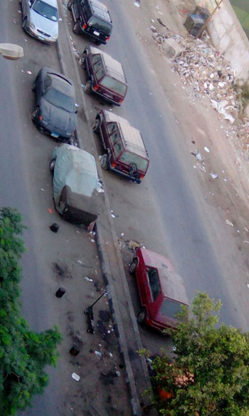 أهالى صقر قريش بالمعادى يعانون من انتشار القمامة وورش السيارات (3)