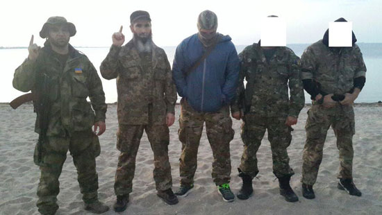 	شعار التنظيم الإرهابى فى أوكرانيا مكتوب عليه اسم الله -اليوم السابع -7 -2015