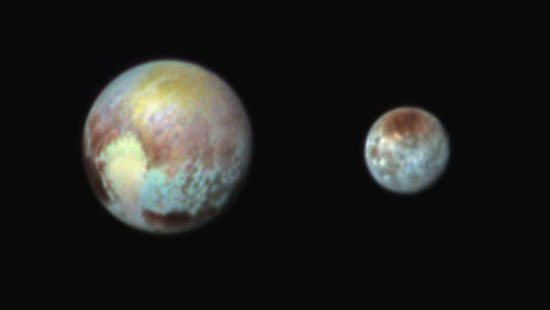 صورة عكسية لكوكب بلوتو وقمره. -اليوم السابع -7 -2015