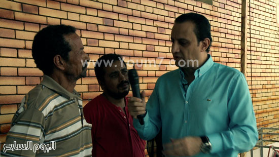 طارق علام مع أحد الغارمين -اليوم السابع -7 -2015