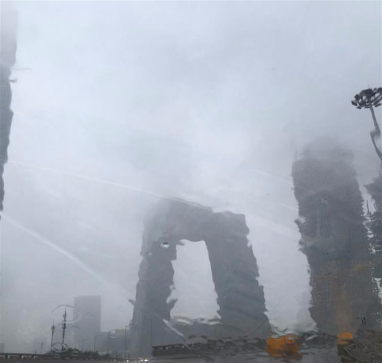 أمطار غزيرة تضرب العاصمة الصينية بكين (4)
