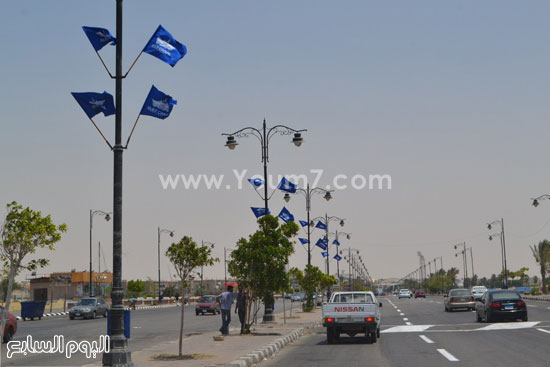 رفع اعلام قناة السويس بشوارع المحافظة -اليوم السابع -8 -2015