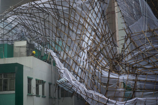 1الإعصار نيدا يتسبب فى إلغاء 150 رحلة جوية فى هونج كونج  (5)