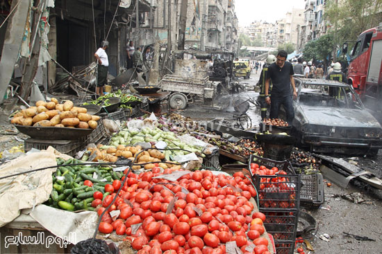 اثار قصف طائرات النظام السورى لاحد اسواق مدينة حلب -اليوم السابع -9 -2015