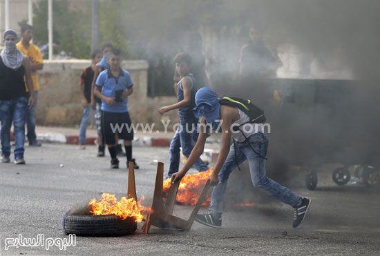 الفلسطينيون يشعلون الإطارات فى مواجهة قوات الأمن  -اليوم السابع -9 -2015