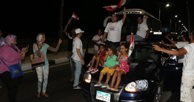 بالصور.. مسيرة تحتفل بافتتاح قناة السويس الجديدة فى مدينة شرم الشيخ  