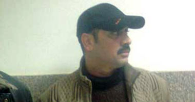 محمد السنى أمين الشرطة المتهم بقتل المتظاهرين 