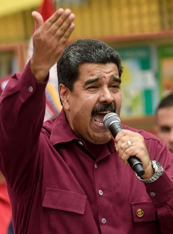 9_ نيكولاس مادورو  رئيس فنزويلا خلال مؤتمر جماهير لحث المعارضة على عدم التصعيد