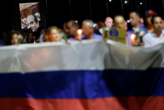 مسيرة للمواطنين بشرم الشيخ تأبينا لذكرى ضحايا الطائرة الروسية
