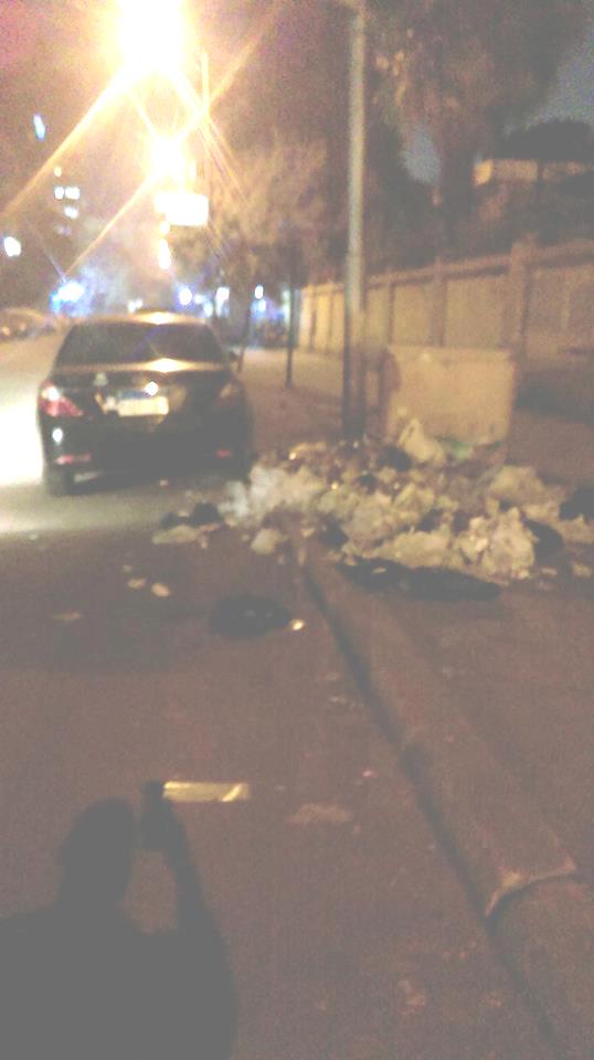 تراكم القمامة بشارع الثورة