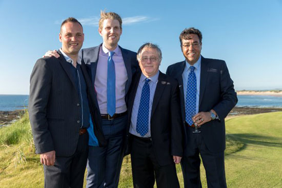 جورج سوريال مع أعضاء بمنظمة ترامب