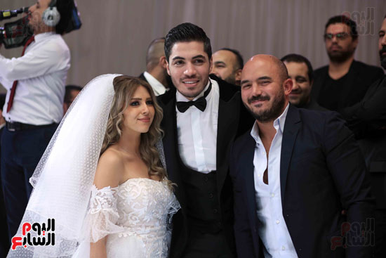 محمود العسيلى والعروسين