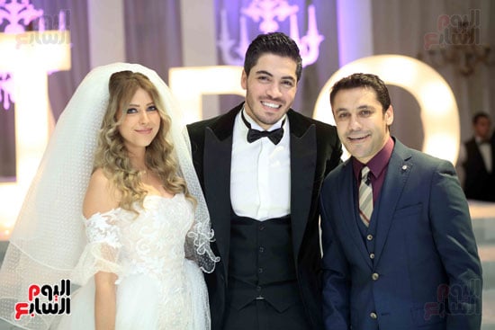 أحمد حسن والعروسين